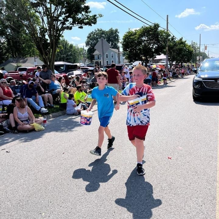 Joyful kids sprinting down the road