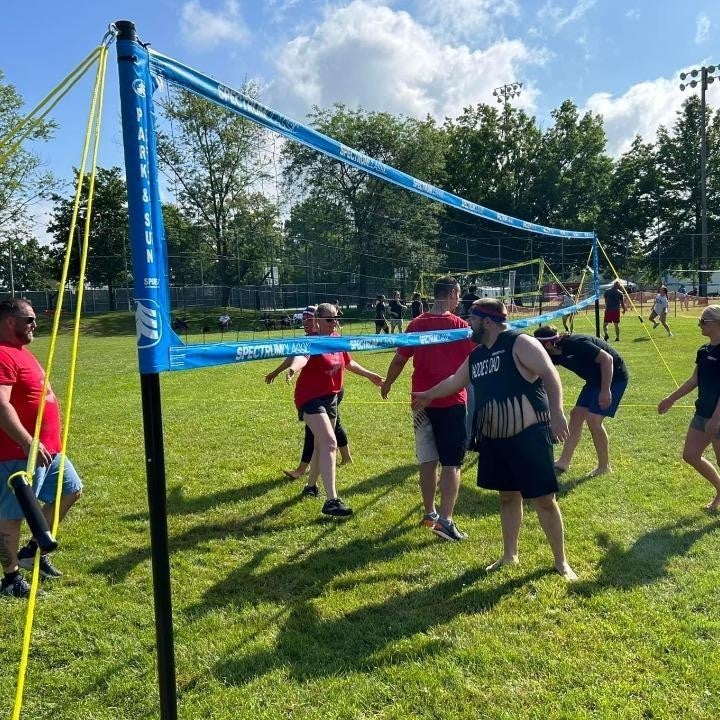 Group enjoying a game on the ground
