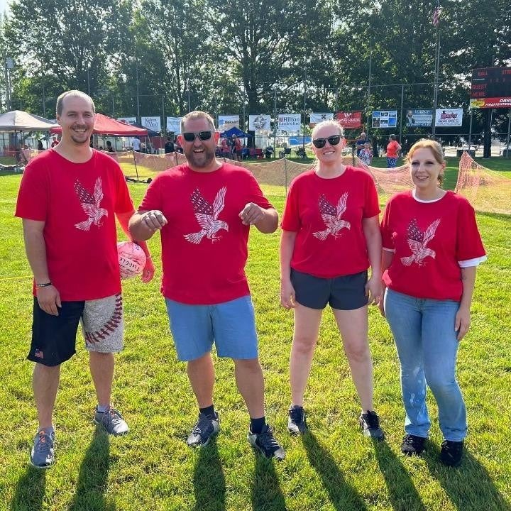 Group posing together on solid ground